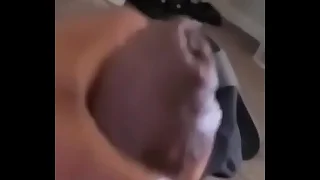 Masturbating